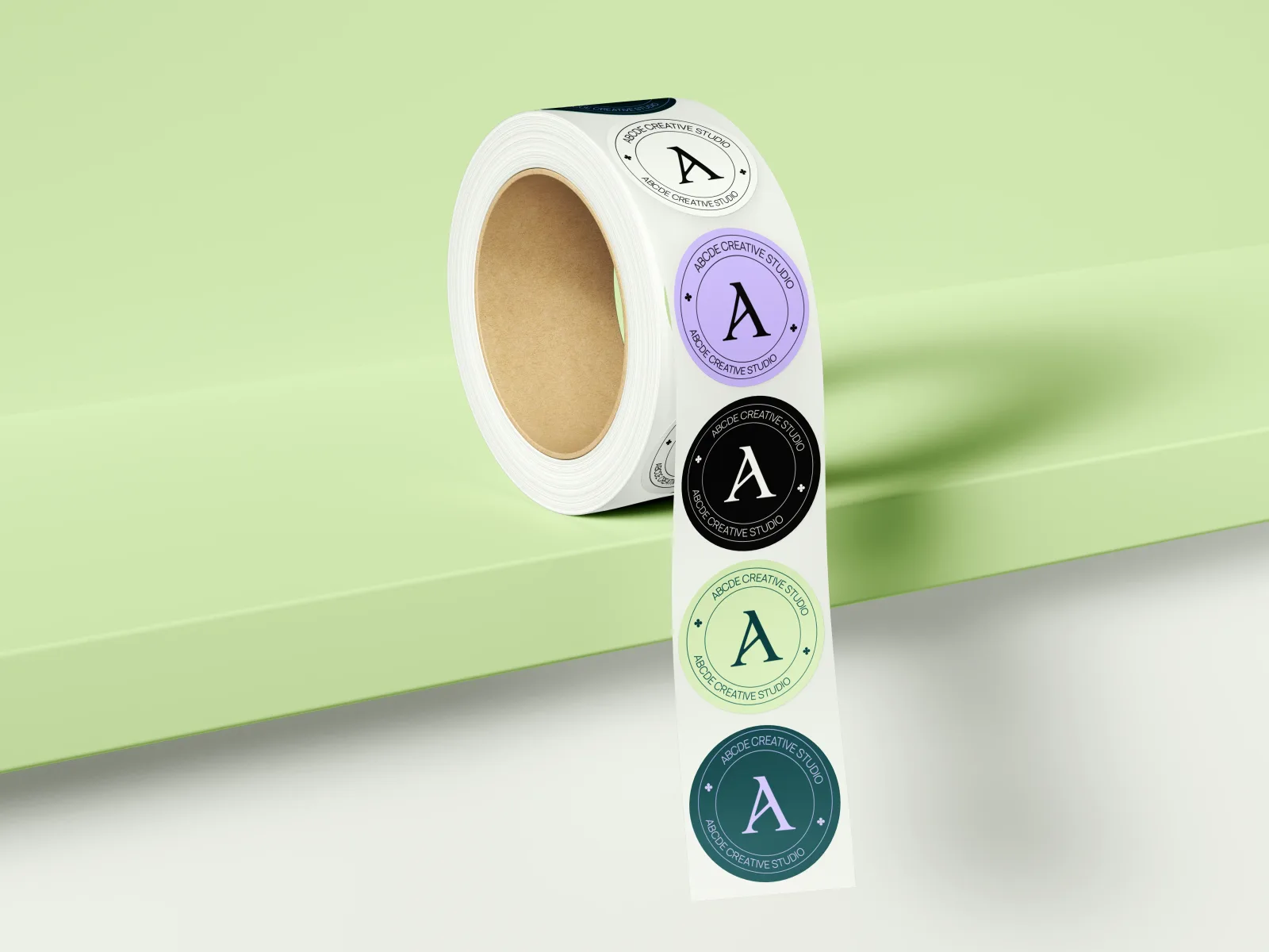 Sticker roll mockup with variants of absihdee (ABCDE) submarks